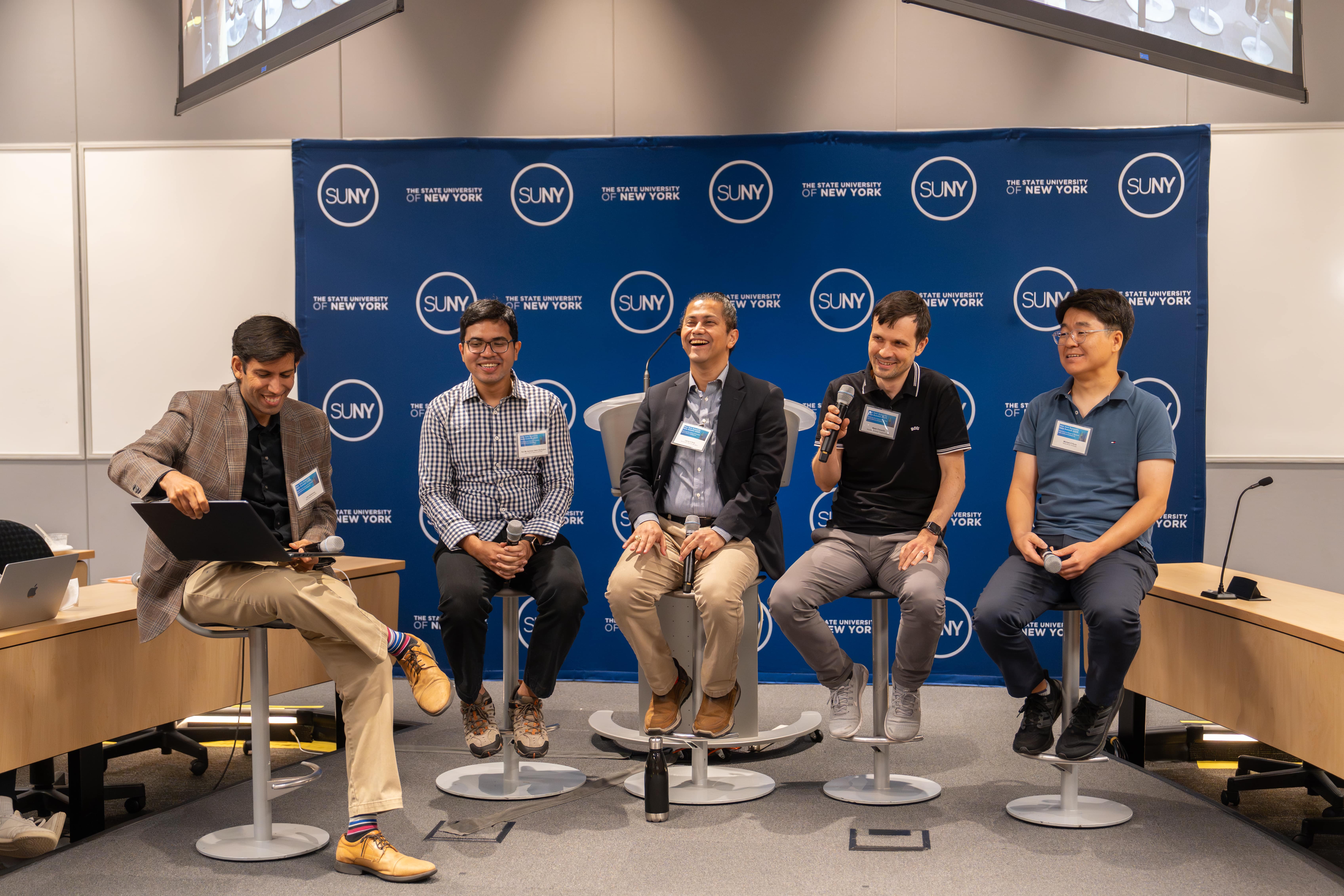 Left to Right: Lav R. Varshney (Stony Brook University),  Nur Muhammad “Mahi” Shafiullah (Meta Fundamental AI Research), Carlos Soto (Brookhaven National Laboratory),  Matei Ciocarlie (Columbia University), and Michael Ryoo (Stony Brook University). Picture Credits: Tim Kuhn.