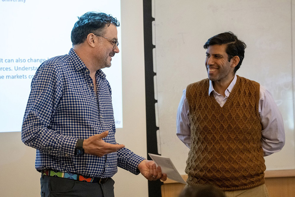 Reuben Kline, associate professor of political science at Stony Brook and director of the Center for Behavioral Political Economy, with Lav Varshney.